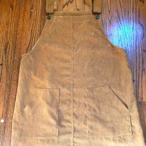 I am selling this beautiful brown jumper dress.